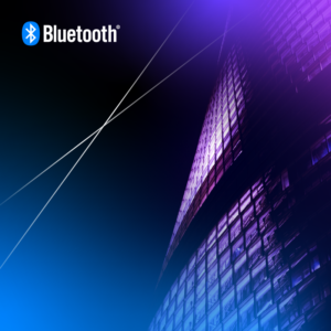 Futuristic Bluetooth logo above a modern high-rise, symbolizing technology and urban innovation.